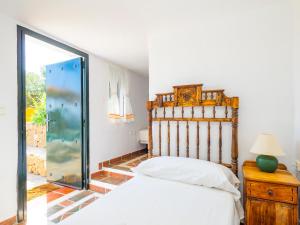 Posteľ alebo postele v izbe v ubytovaní Tu Villa Rural Olivo 3 Dormitorios Piscina privada