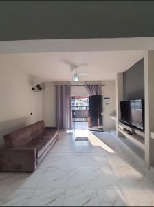 TV a/nebo společenská místnost v ubytování Casa Recanto Paraíso