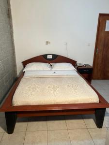 Voodi või voodid majutusasutuse Prodiges Hôtel toas