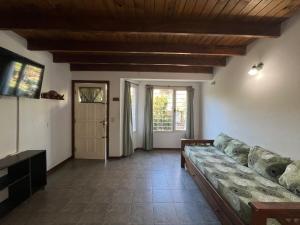 Et tv og/eller underholdning på Depto Valeria del Mar 3 Ambientes