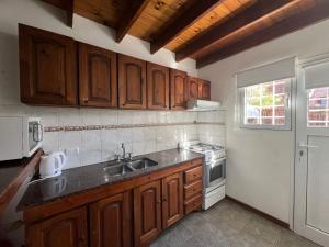 Køkken eller tekøkken på Depto Valeria del Mar 3 Ambientes