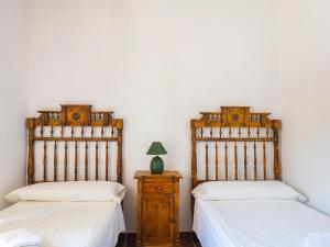Posteľ alebo postele v izbe v ubytovaní Tu Villa Rural Olivo 3 Dormitorios Piscina privada