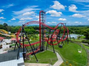 a roller coaster at an amusement park at Nueva Finca, Piscina, Jacuzzi Y Fire Pit in Alcalá