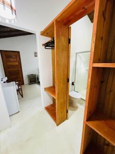a bathroom with a toilet in a room at Pousada Amor de Casa in Trancoso +64 photos