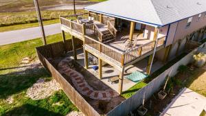 an overhead view of a house with a playground at Spacious & Pet Friendly - Game Room Sleeps 10 in Port Aransas