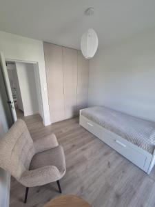 Posezení v ubytování Apartament ZAMKOWA PARK Węgorzewo