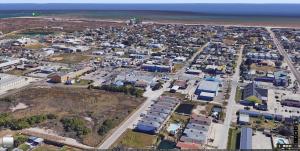 an aerial view of a city next to the ocean at The Oasis - Pet Friendly Optional Golf Cart in Port Aransas