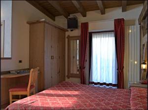 Ένα ή περισσότερα κρεβάτια σε δωμάτιο στο Hotel Avio +38 φωτογραφίες