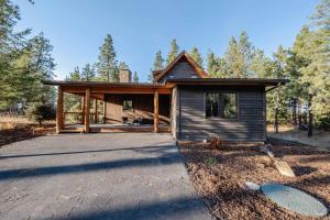 a small house in the woods at Wilderness Club Cabin - Sleeps 7 in Eureka