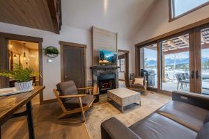 a living room with a couch and a fireplace at Wilderness Club Cottage on 18th Green in Eureka