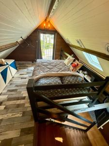 a bedroom with a bed in a tent at Chalet front de mer in Pénestin