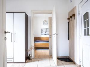 Postel nebo postele na pokoji v ubytování "Spitzhausblick" in het Huis Felix