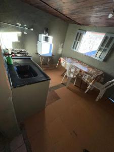 Kuchyň nebo kuchyňský kout v ubytování Dunymar Apartamento