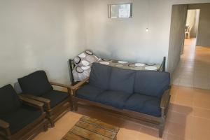 Posezení v ubytování Dunymar Apartamento
