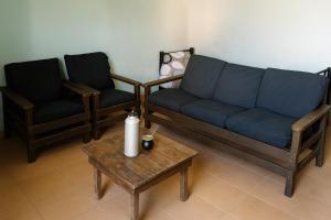 Posezení v ubytování Dunymar Apartamento