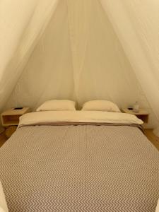 Ένα ή περισσότερα κρεβάτια σε δωμάτιο στο Durmitor glamping