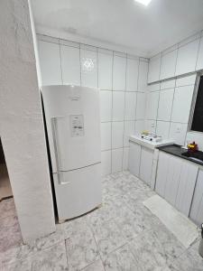 Η κουζίνα ή μικρή κουζίνα στο Casa Recife Padrão T2