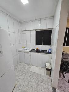 Η κουζίνα ή μικρή κουζίνα στο Casa Recife Padrão T2