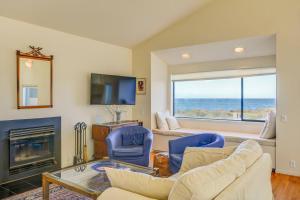 a living room with a view of the ocean at Neel Nirvana - Deck With BBQ & Community Pool in Sea Ranch