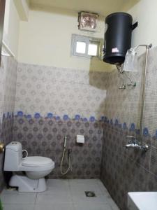 Et badeværelse på Flat For Rent