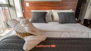 เตียงในห้องที่ Studio em Vila Mariana com coworking no prédio