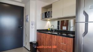 ครัวหรือมุมครัวของ Studio em Vila Mariana com coworking no prédio