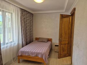 Кровать или кровати в номере Elegant 2-bedroom apartment with a terrace