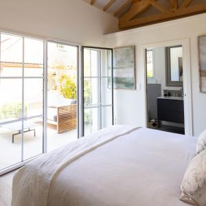 En eller flere senge i et værelse på Villa des Pensières