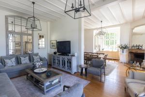 Et opholdsområde på Villa des Pensières