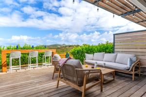 Les Griselles 3 Hauts Baie Orientale - Appart 1ch 4p vue MER的阳台或露台