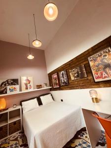 Ένα ή περισσότερα κρεβάτια σε δωμάτιο στο Moonshine Boutique Hostal