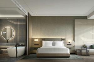 Postel nebo postele na pokoji v ubytování Changsha Marriott Hotel West