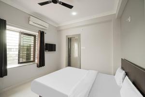 Una cama o camas en una habitación de HOTEL SIGNATURE PREMIUM