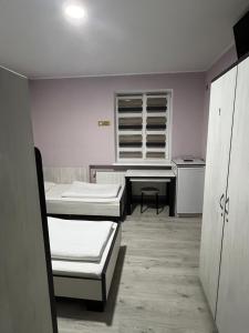 Kuchyň nebo kuchyňský kout v ubytování Guest House MAX + 37 fotografií