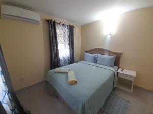 Postel nebo postele na pokoji v ubytování OB Apt 2