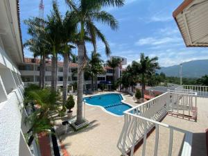 a view from the balcony of a resort with a swimming pool at Grupo Hotelero Panoramico in Ciudad Victoria