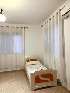 Postel nebo postele na pokoji v ubytování Tranquila House