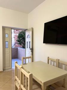 TV a/nebo společenská místnost v ubytování Tranquila House