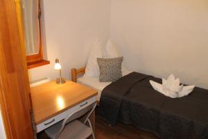 Katil atau katil-katil dalam bilik di Rose Lakeside Apartman
