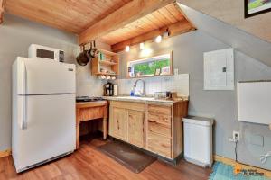Kuchyň nebo kuchyňský kout v ubytování DFA Cabin Rentals