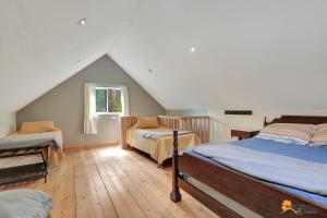 Postel nebo postele na pokoji v ubytování DFA Cabin Rentals