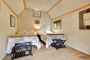 Postel nebo postele na pokoji v ubytování DFA Cabin Rentals