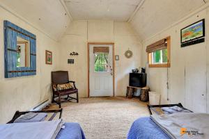 Postel nebo postele na pokoji v ubytování DFA Cabin Rentals