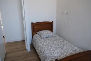 Ένα ή περισσότερα κρεβάτια σε δωμάτιο στο Côte Ouest
