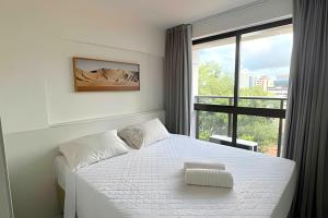 Katil atau katil-katil dalam bilik di Flat à 200m do mar Compact Tambaú +51 gambar