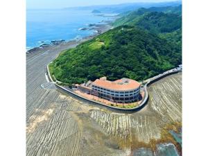 an aerial view of a resort on the beach at Hotel Aoshima Cinqmale - Vacation STAY 67405v in Miyazaki