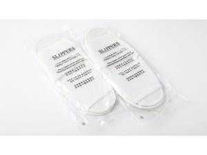 two white toothbrushes sitting in a plastic bag at Smile Hotel Kitaasaka - Vacation STAY 69671v in Asaka