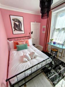Ένα ή περισσότερα κρεβάτια σε δωμάτιο στο Cosy Retreat in Georgian Bath