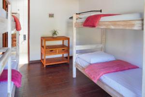 Casa delas Ilhabela客房内的一张或多张床位