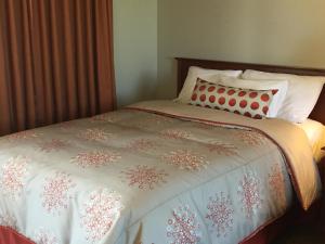 Postel nebo postele na pokoji v ubytování Hôtel Maison Blanche
